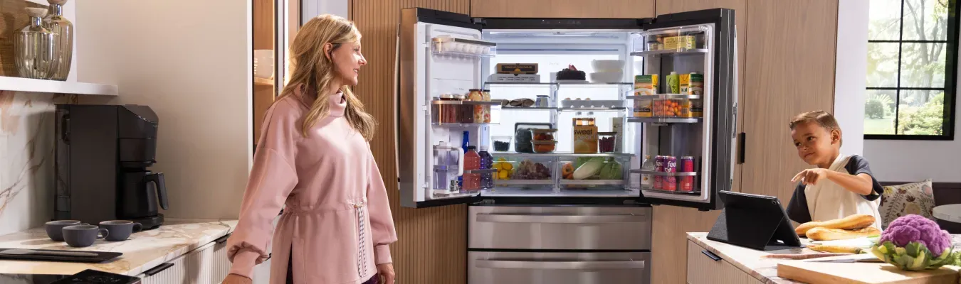 ge-profile-PJD23BYWFS-counter-depth-open-refrigerator-mom-and-son-hero